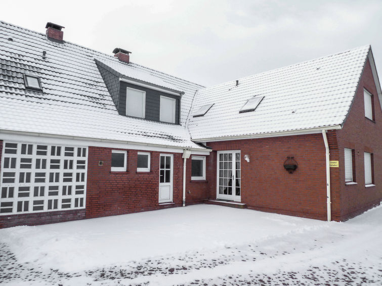 Foto van exterieur van Appartement Norddeichin de winter