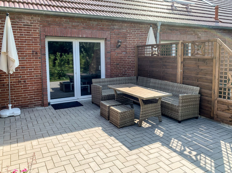Foto van exterieur van Appartement Westerholtin de winter