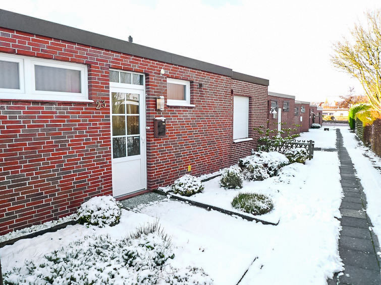 Foto van exterieur van Vakantiehuis Norddeichin de winter