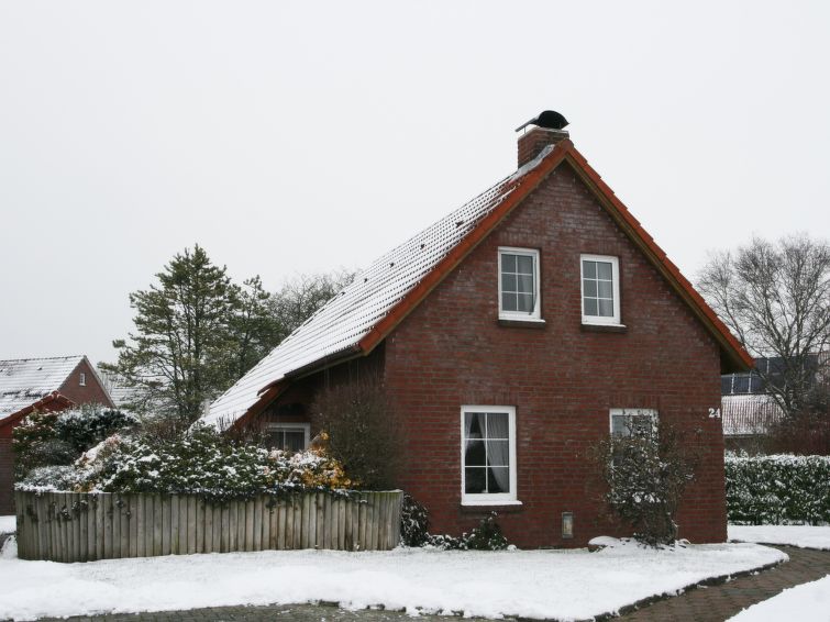 Foto van exterieur van Vakantiehuis Norddeichin de winter