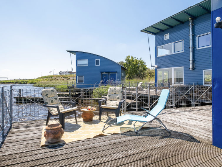 Rietwoning 17: Genieten aan het Water in Lauwersoog | Out! Vakantiehuizen